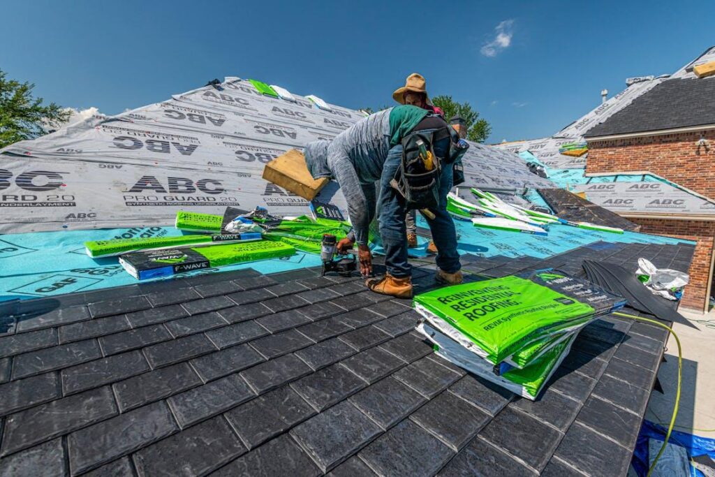 Workers installing a home roof
