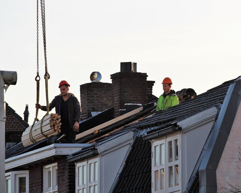 Roofers working on a roof