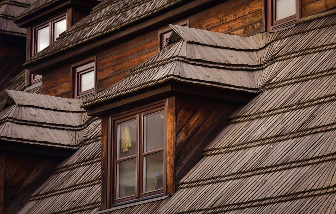 Windows of an attic on the roof of a house