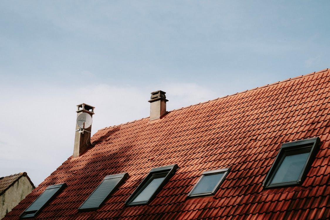 A roof with brown tiles